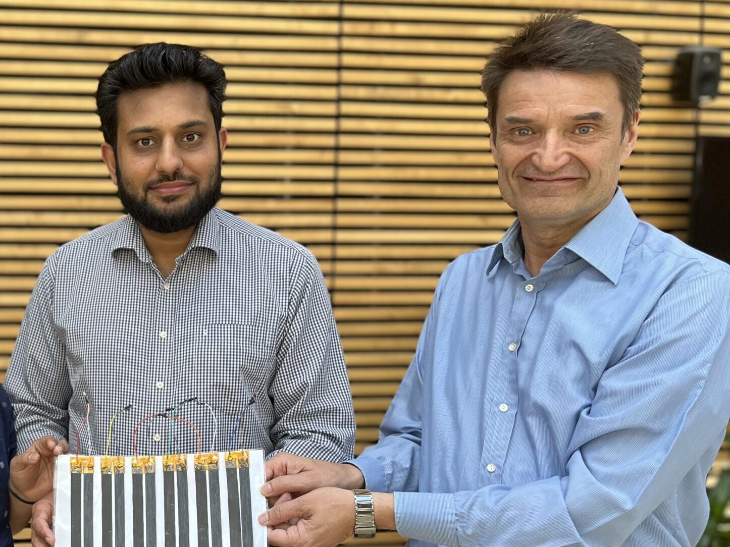 Tanweer and Martti proudly showing the sensors.